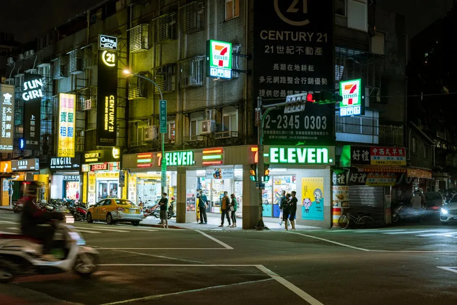 A 7-Eleven convenience store at night in Taiwan where travelers top up EasyCard and pay bills