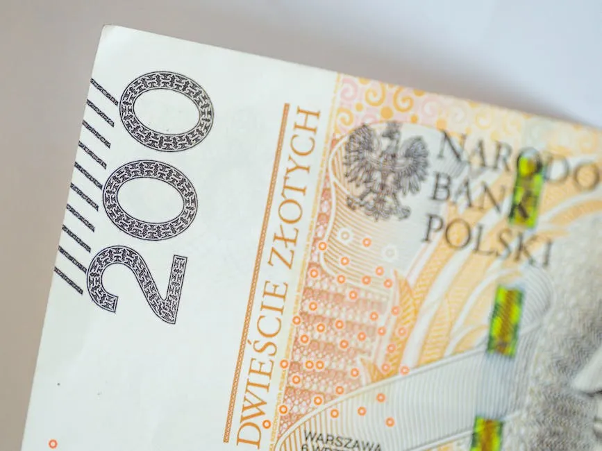 Close-up of a 200 Polish Zloty banknote showing design and security features.