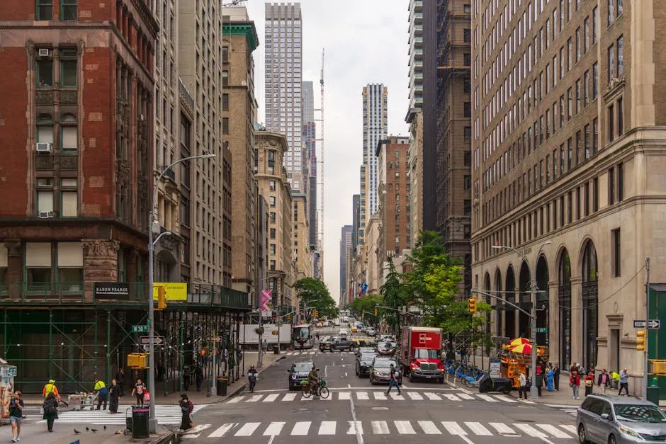 Midtown Manhattan street scene in New York City showing traffic and pedestrians