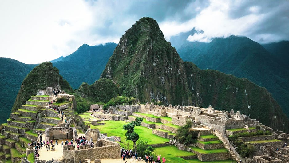 Machu Picchu Inca ruins in Peru with mountains in background - Latin America travel