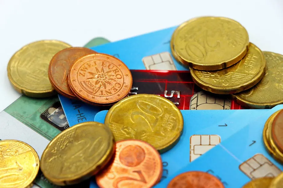 Euro coins and payment cards for Malta travel spending