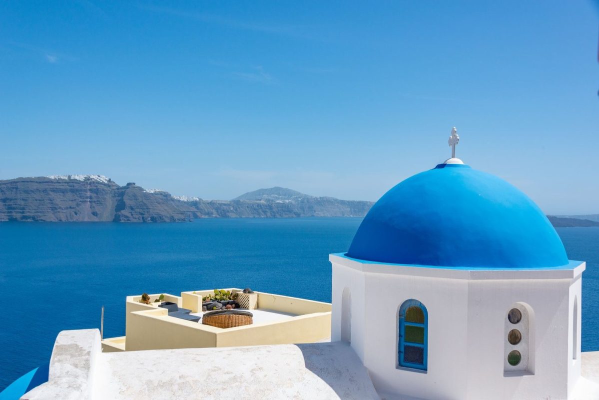 Whitewashed houses in Santorini, Greece travel eSIM guide