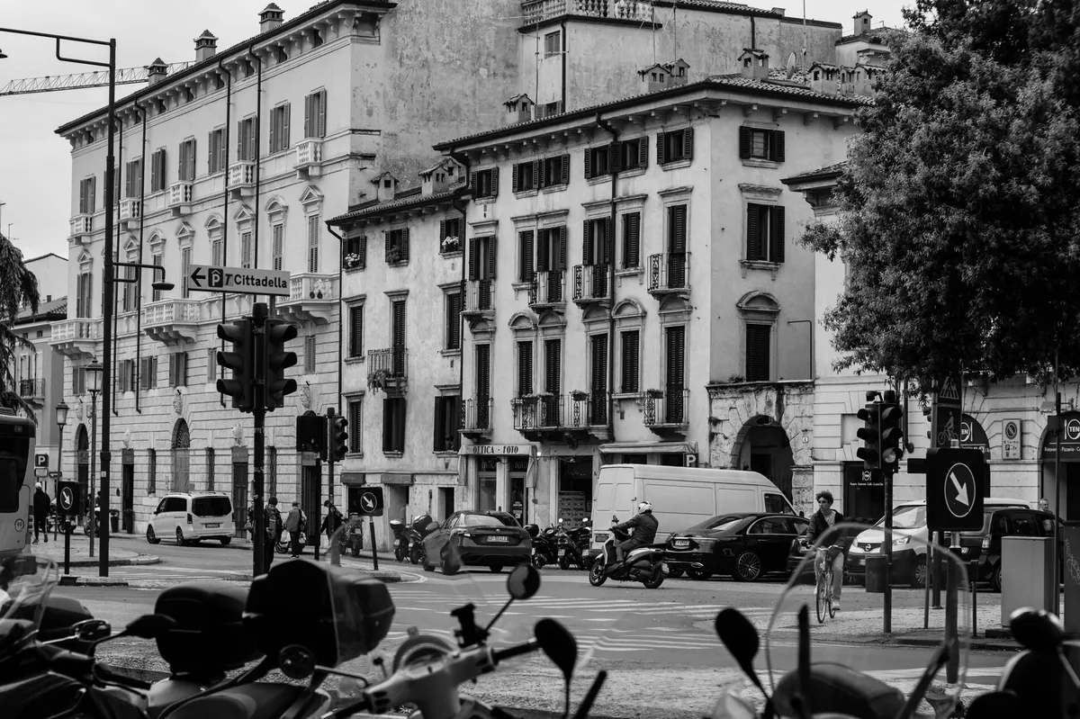 Scooters and traffic on a street in Rome, Italy